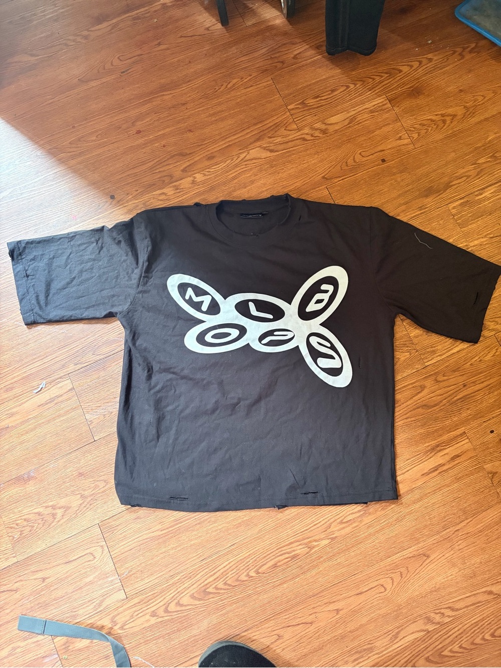 Men's Black Short-Sleeve Graphic Tee with Silver Logo